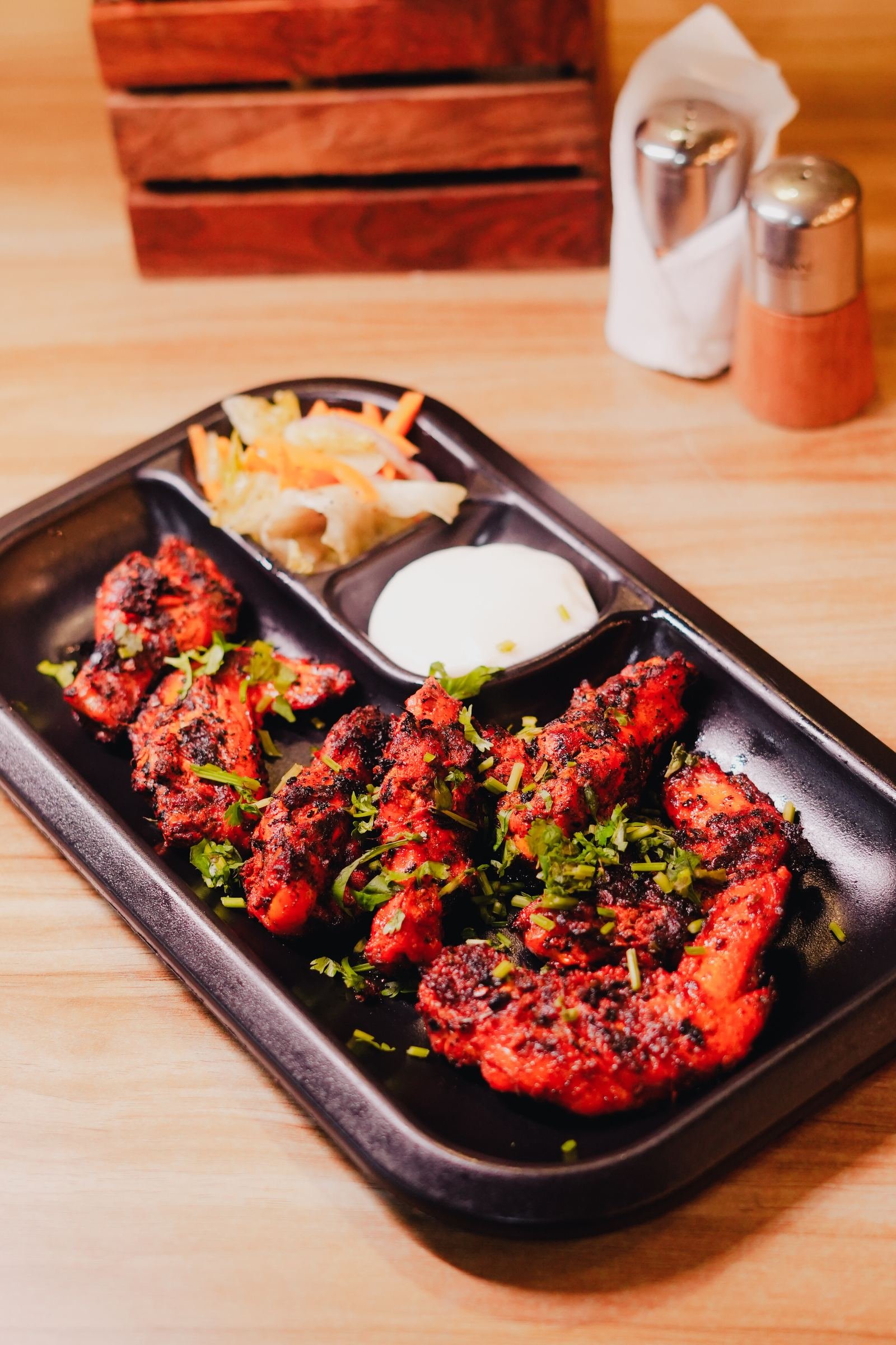 Chargrilled tandoori chicken wings served at Barbeque Station, Koramangala